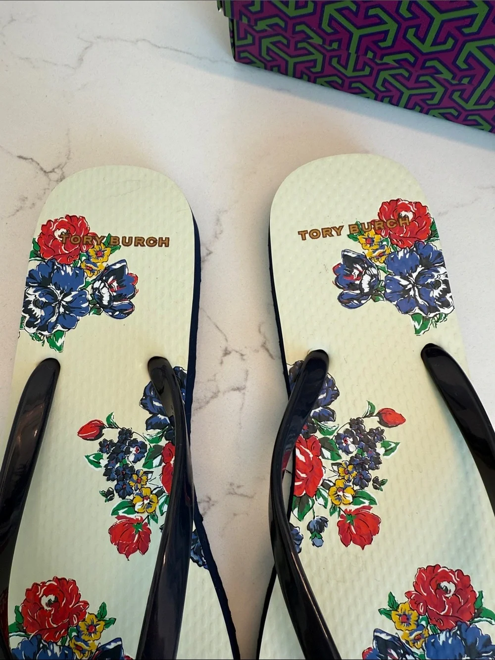 Tory Burch Floral Flip-Flop Sandals in Navy and Cream with Gold Logo